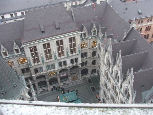 Courtyard of Munich's Neues Rathaus seen from above among neo-Gothic spires