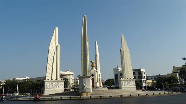 Democracy Monument in Bangkok, concrete obelisks surround the central turret