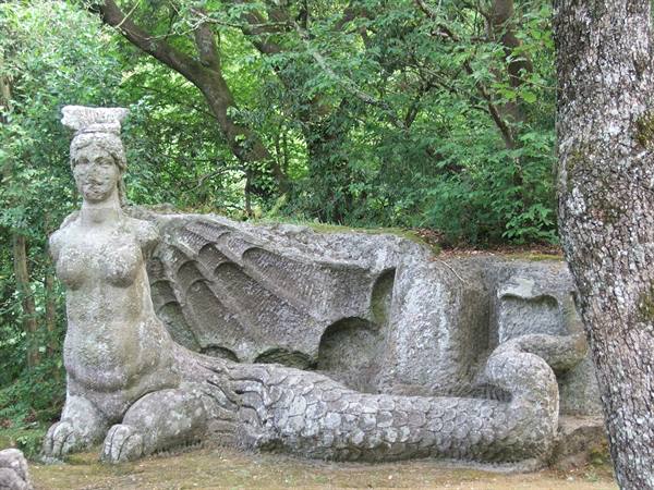 Stone siren statue with scaled tail, Sacred Grove of Bomarzo