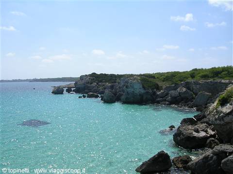 White limestone rocks and turquoise sea along the Salento coast