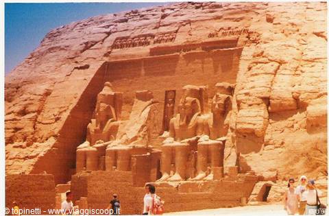 Tourists before the seated colossi of the Great Temple of Abu Simbel