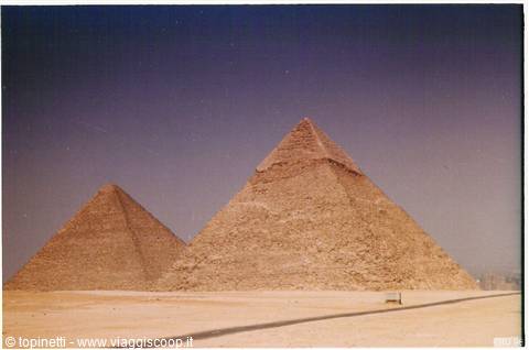 Khufu and Khafre pyramids at Giza, limestone blocks under a purple sky