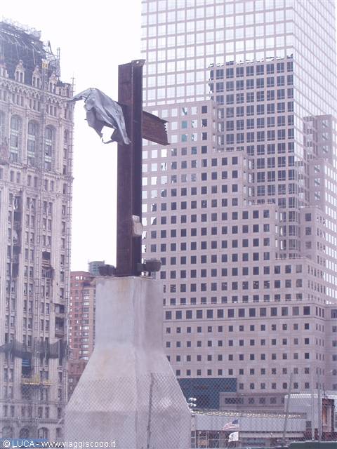 Steel cross amid skyscrapers at Ground Zero, New York