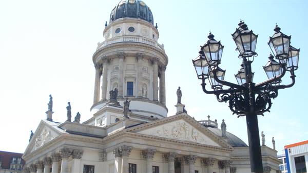 French Cathedral dome at Gendarmenmarkt, Berlin, with wrought-iron street lamp