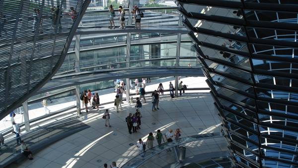 Visitors on two spiral ramps inside the Reichstag glass dome