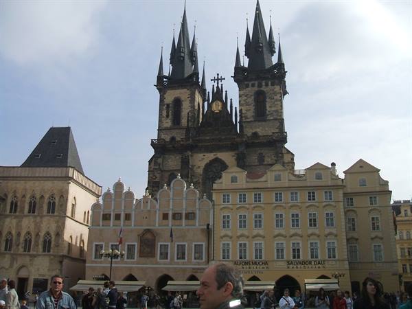 Tourists in Old Town Square in front of Týn Church, Prague