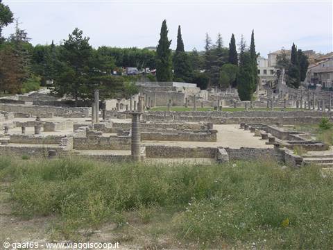 Roman ruins of Vaison-la-Romaine, columns and ancient walls among cypresses