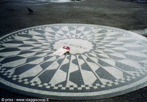 On the mosaic in Strawberry field there are still people leaving flowers, notes, poems..