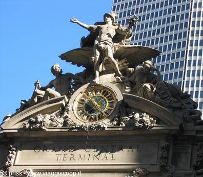 Statue with Mercury and golden clock on the Grand Central Terminal façade