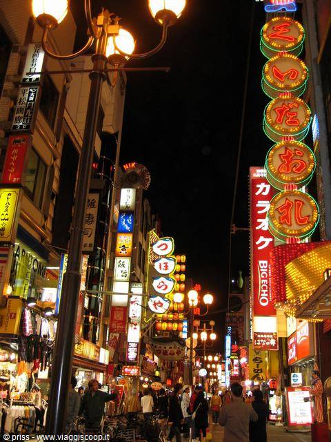 Dotonbori in Osaka: glowing neon signs over the crowded street at night