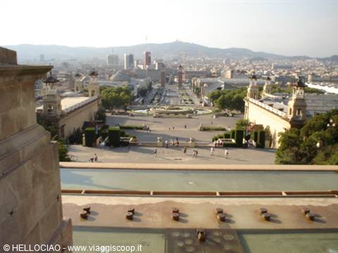 Barcelona seen from Montjuïc steps, fountains and avenue with people