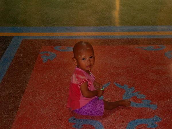 GIRL AT THE TEMPLE