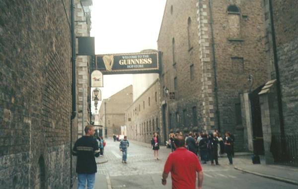 Visitors at the Guinness Hopstore entrance, brick warehouses, Dublin