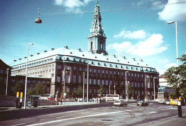 Christiansborg in Copenhagen, green copper palace with spire and traffic