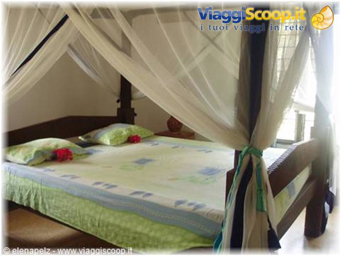 Our romantic four-poster bed at Kikka's house