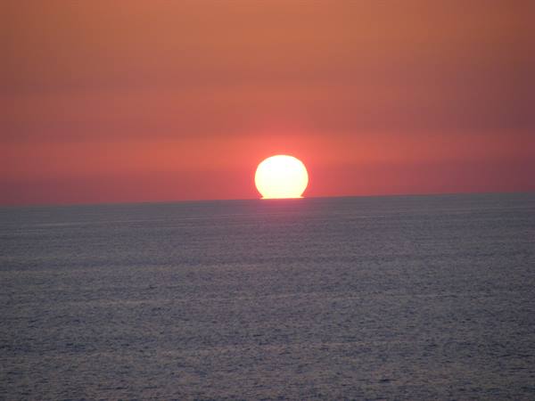 ball of fire into the sea