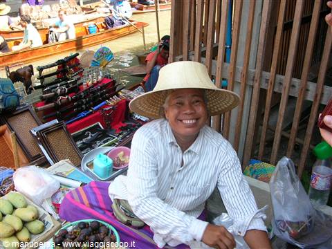 AT THE FLOATING MARKET..