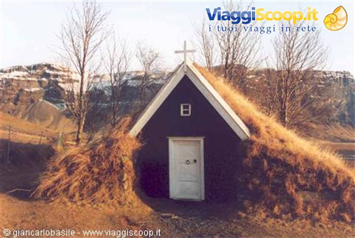 Núpsstaðakirkja turf church with grass roof and white door