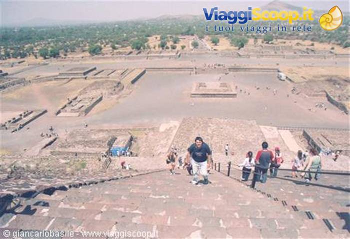 Teotihuacan: tourists descending the Moon Pyramid stairs toward the Avenue of the Dead