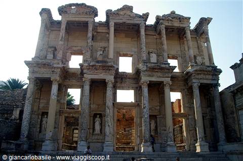 Ancient facade of the Library of Celsus in Ephesus, marble columns backlit