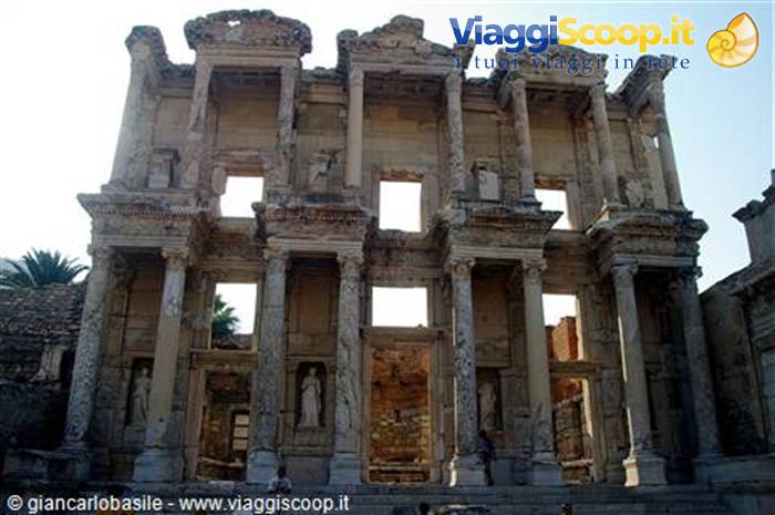 Ancient facade of the Library of Celsus in Ephesus, marble columns backlit