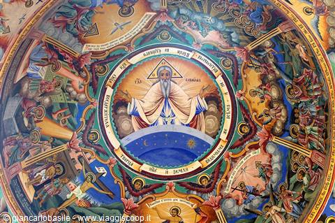 Frescoed dome of Rila Monastery with Christ Pantocrator surrounded by biblical scenes