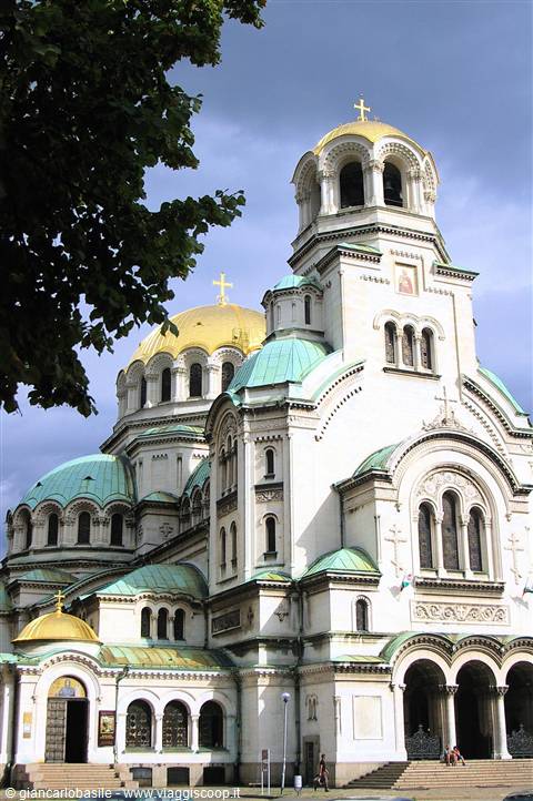 Alexander Nevsky Cathedral in Sofia, golden and green domes under cloudy sky