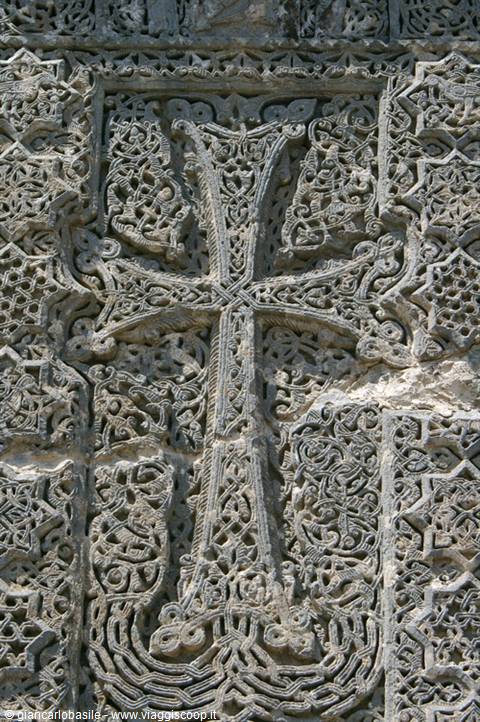 Stone khachkar with carved cross and intricate ornamental interlace patterns